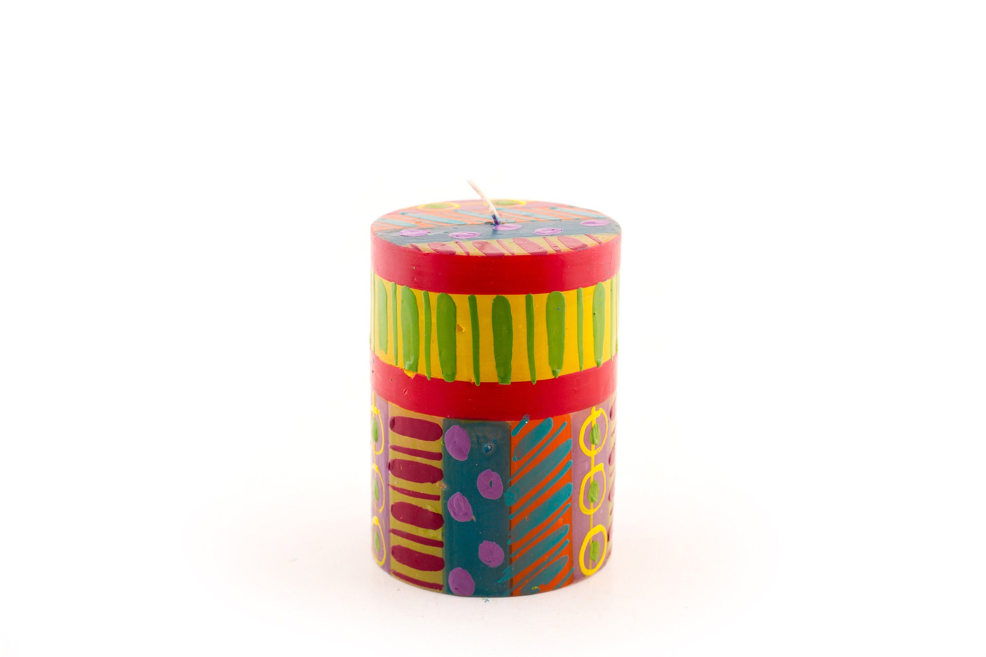 Carousel 3 X 4" pillar candle. Dots, stripes and circles in pinks, purple, yellow, red, greens and turquoise!
