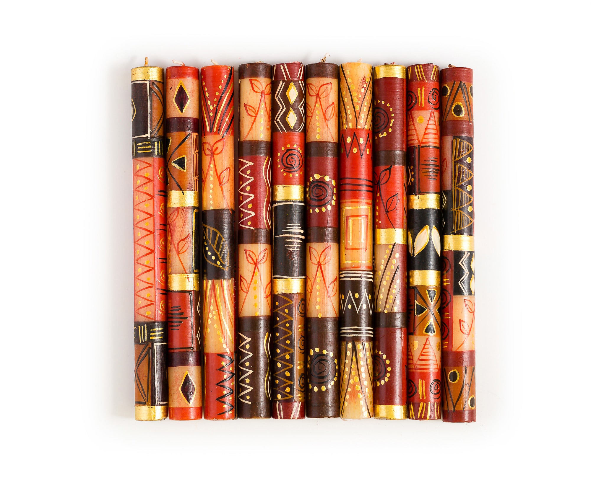 10 Safari Gold tapers that show the 10 designs of this collection. Warm tones of brown, rust and gold.