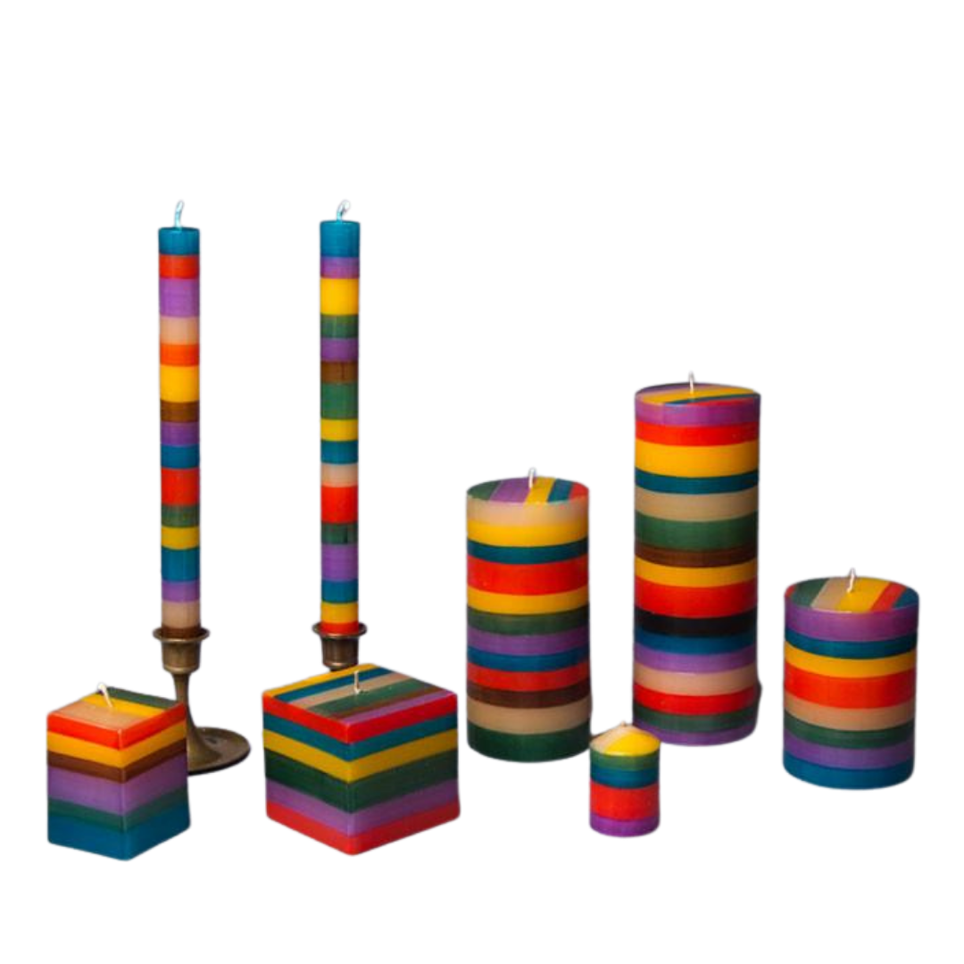 Memphis Stripe hand made and hand painted candle collection. Cube candles, taper candles, pillar candles, and votive candles. Painted with stripes of turquoise, orange, yellow, green and red. Very fun! 