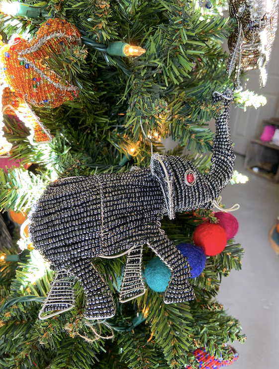 Hand made beaded animals are fun to use as tree ornaments!  Here is an elephant.  Fair trade products. 