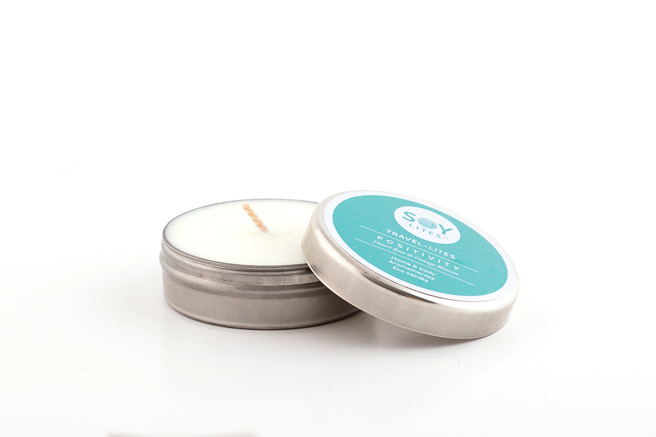 Soylites travel tin of Positivity soy wax.  Small silver tin with lid, great for travel!  Desert Rose & Orange Blossom.