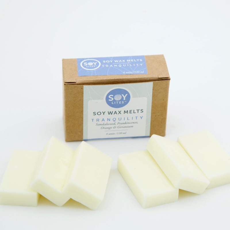 Tranquility box of wax melts (Sandalwood, Frankincense, and Geranium) Used in burners to scent your rooms. 6 bars that are reusable. Recycled paper box.