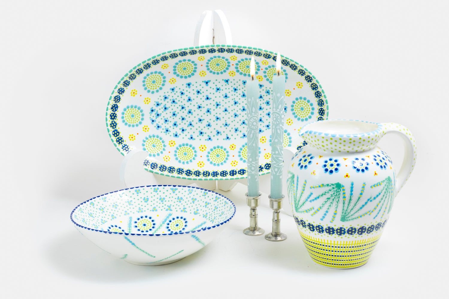 Beautiful whitewater jug, large oval serving bow, and large round serving bowl  along side a water jug and pair of Henna duckegg taper pairs. Beautiful collection!