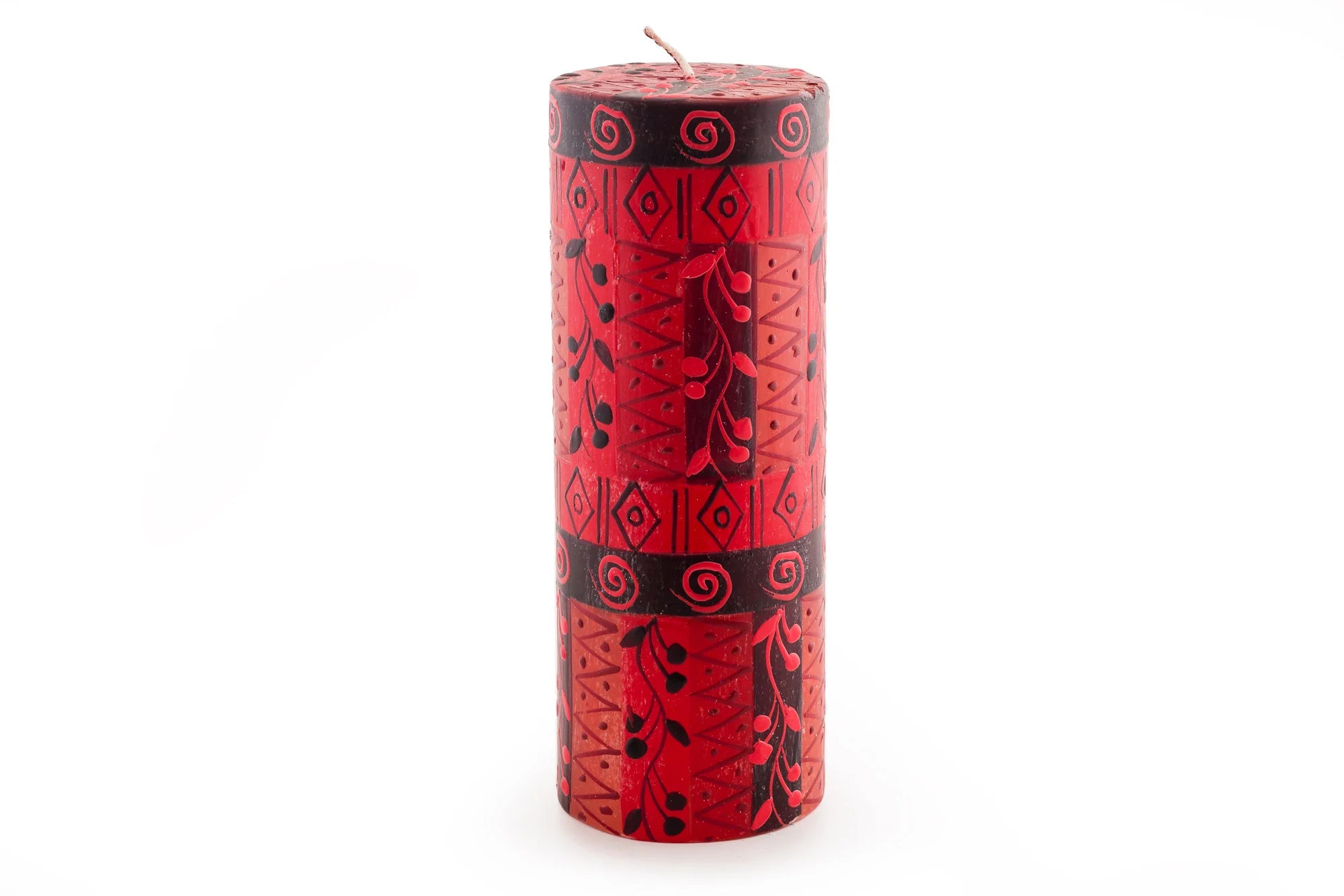 3" x 8" Berry Blaze pillar candle. Bright red with darker berry design mixed with geometric design.