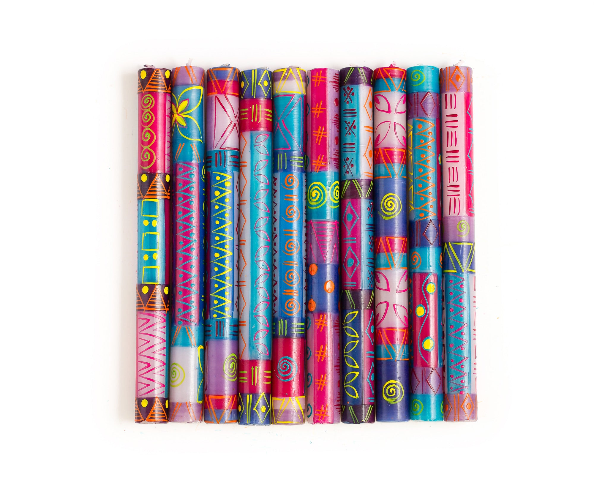 10 Blue Moon tapers showing the 10 designs in this collection. Purple, turquoise, yellow, fuchsia, and red - colorful like the Blue Moon!