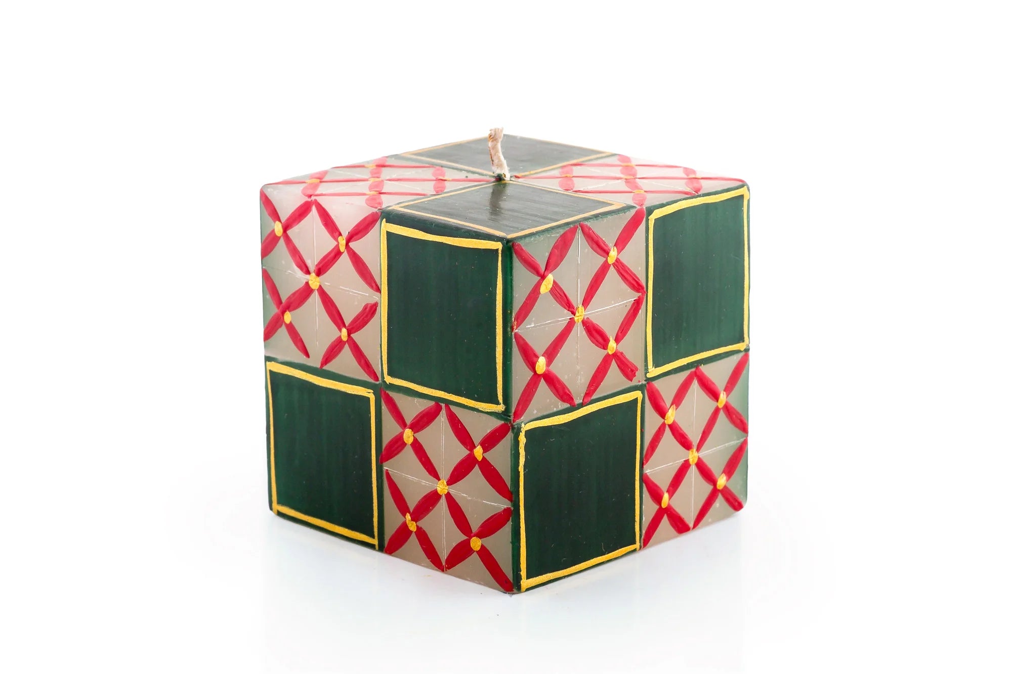 3" x 3" x 3" Christmas cube in various traditional Christmas patterns in red, dark green, light green and gold. This cube is painted with red checkerboard design with green squares.