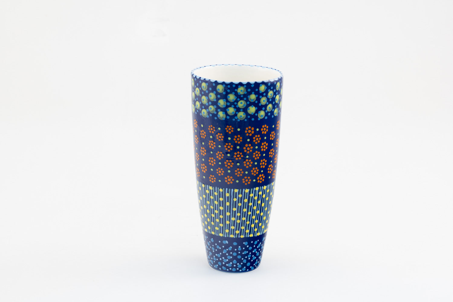 Classic vases with background color of indigo blue. Dots, stripe and flowers make the colorful designs on the background colors. 12" tall x 6" wide.