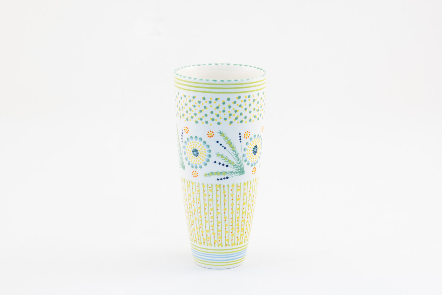 Classic vases with background color of white. Dots, stripe and flowers make the colorful designs on the background colors. 12" tall x 6" wide.