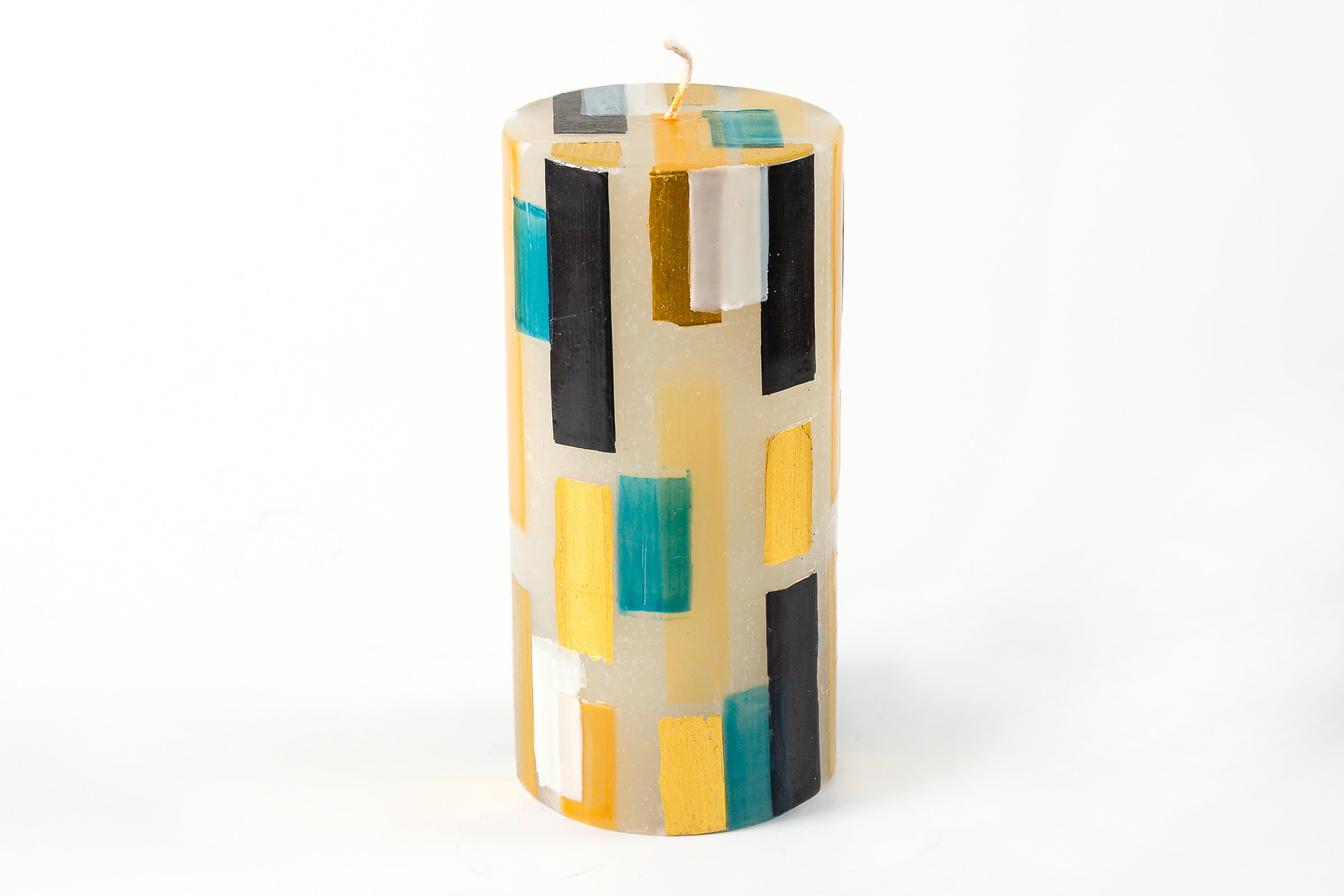 Klimt 3" x 6" Pillar Candle. Creamy white base color candles with touches of black, gold along with hints of turquoise.