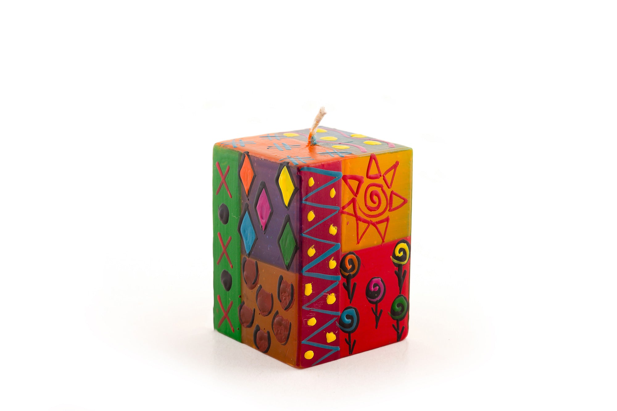 Multicolor Ethnic 2x2x3 cube candle. Bright, colorful, sunshine and fun designs that sing out Africa!