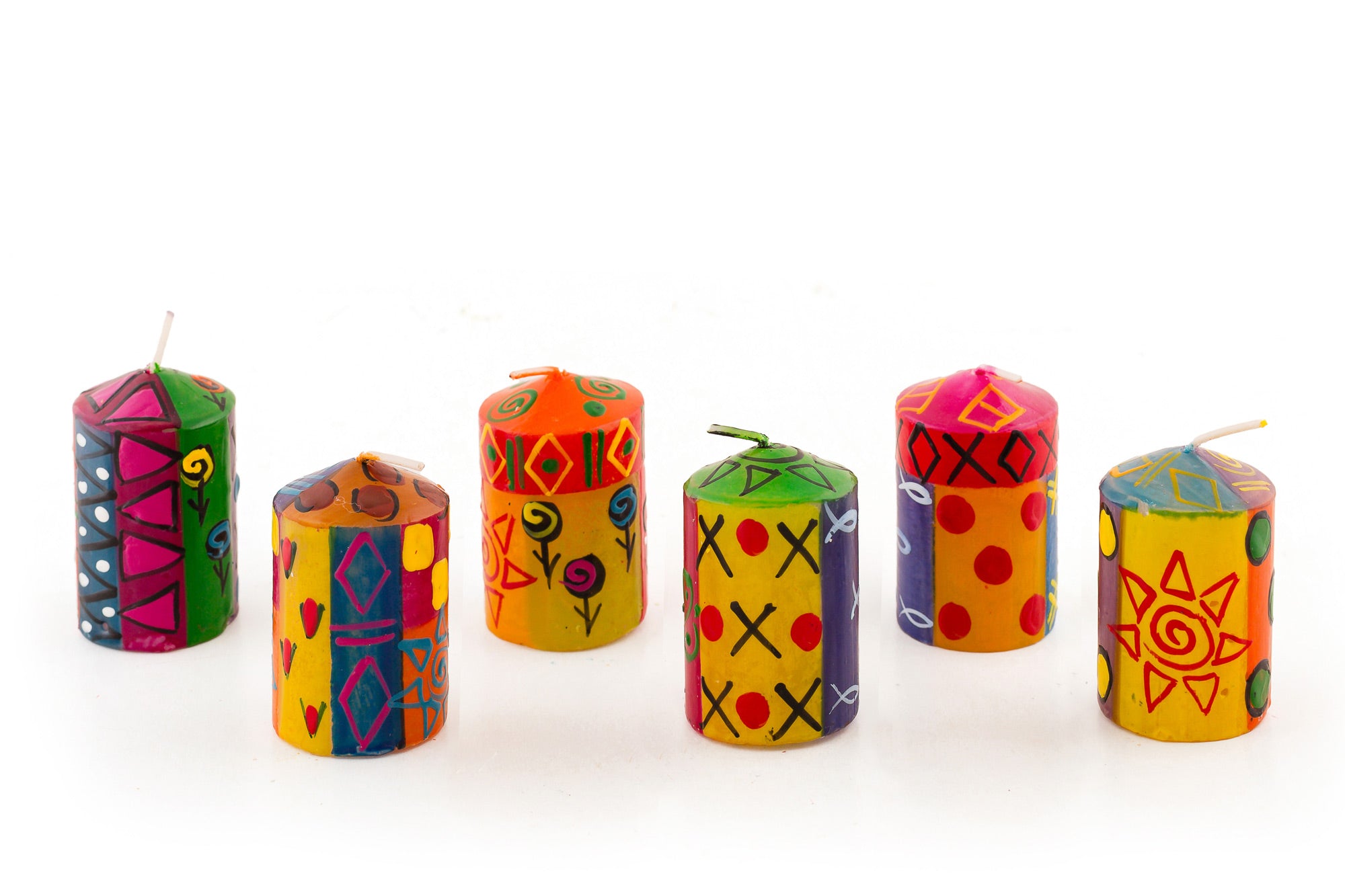 Six votives in various designs of Multicolor Ethnic. Bright, colorful, sunshine and fun designs that sing out Africa! The votives come in a 6 pack.