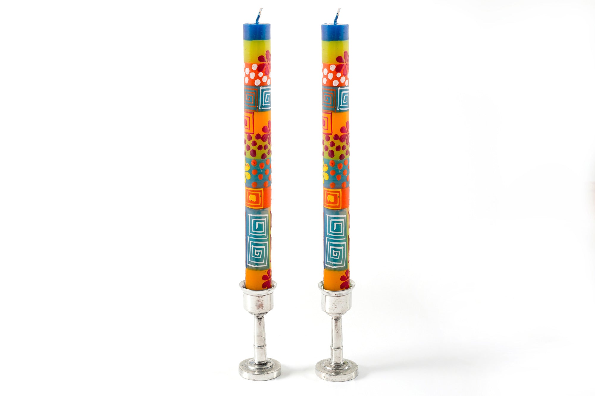 Summer taper match pair in silver pewter taper holders. Tapers are full of summer colors, with flowers, dots stripes & squares.