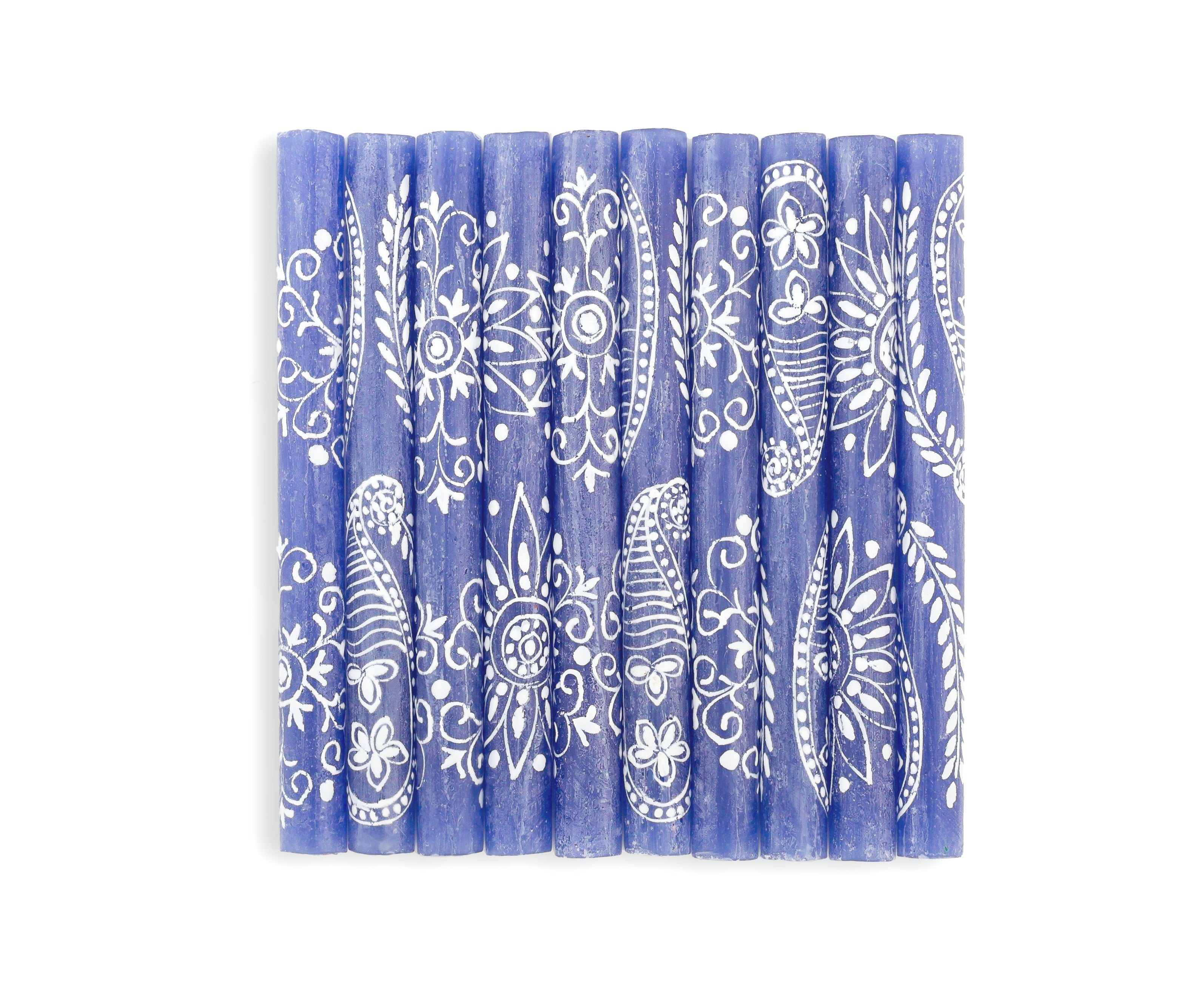 Henna white on blue candle collection.  10 9" tapers with the different designs of the collection. Henna designs painted in white on blue candles.  