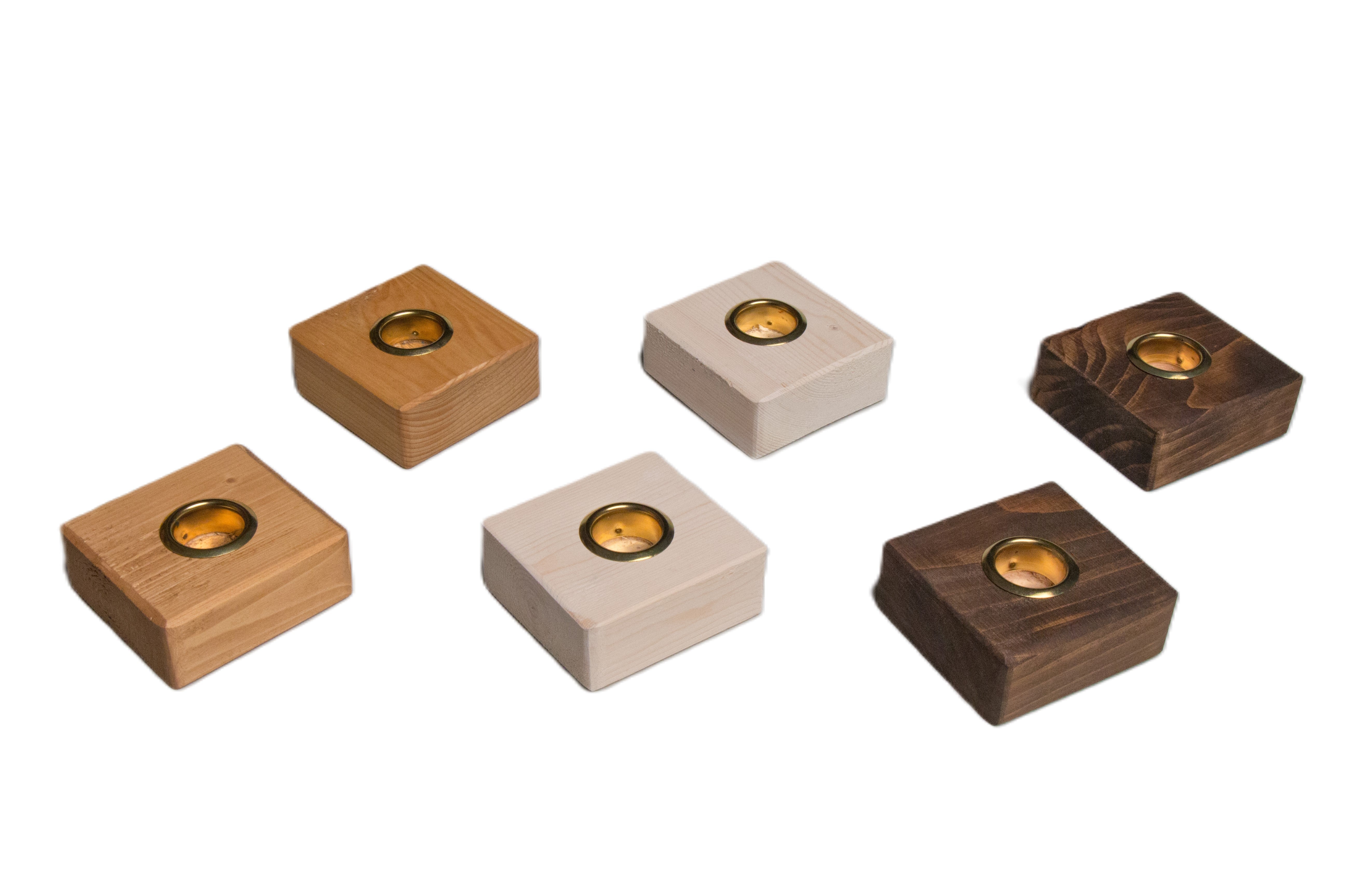Wood Taper Candle Holders in golden wood color, white wash wood color, and dark brown. Gold edging holds the taper candle.