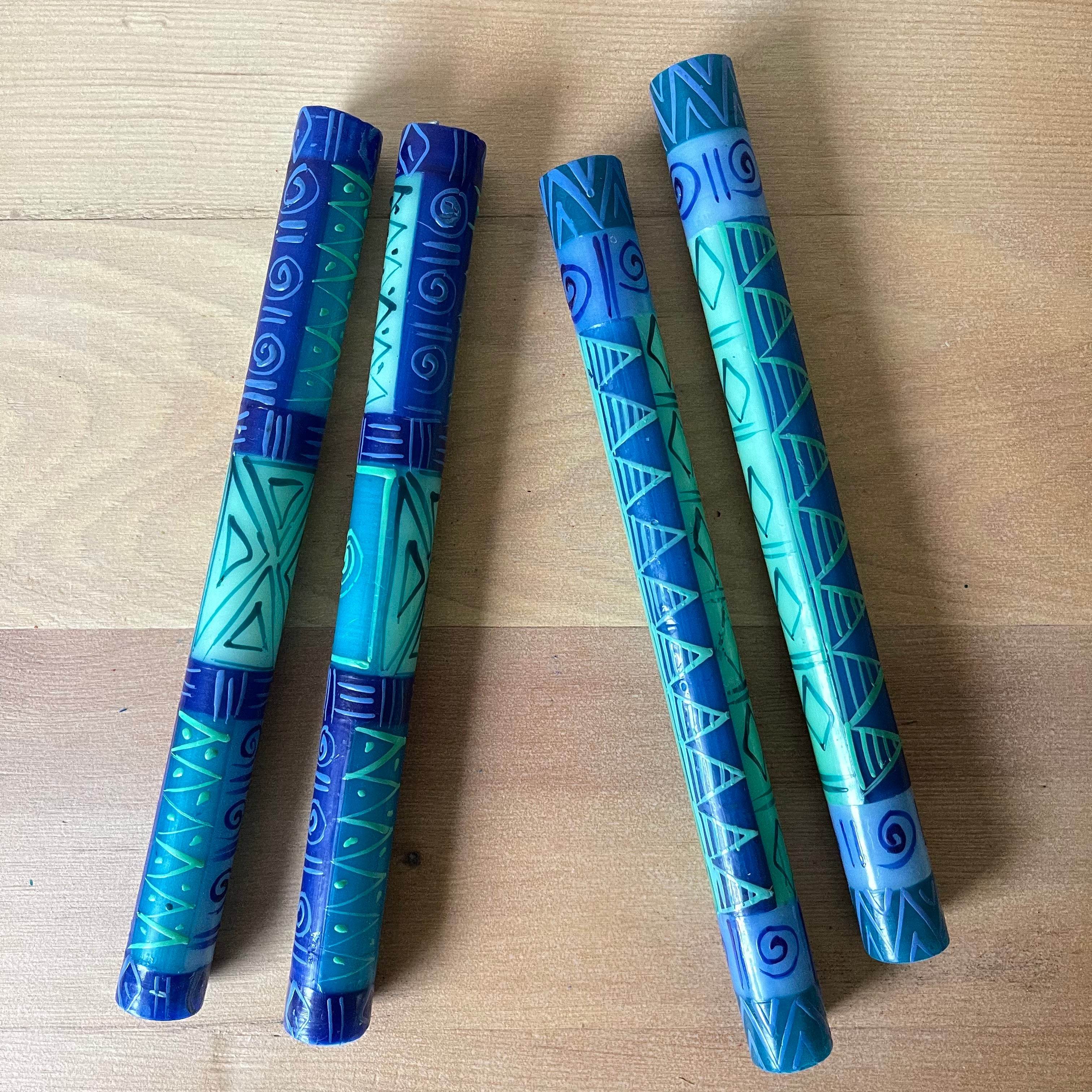 Two Blue & Green taper pairs showing two different blue & green patterns, but the candle pairs  come in a matched design.