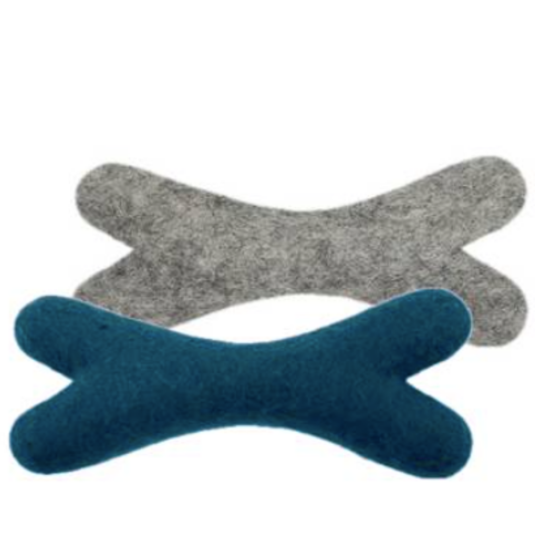 Two felted wool dog bones one grey and one blue. 
