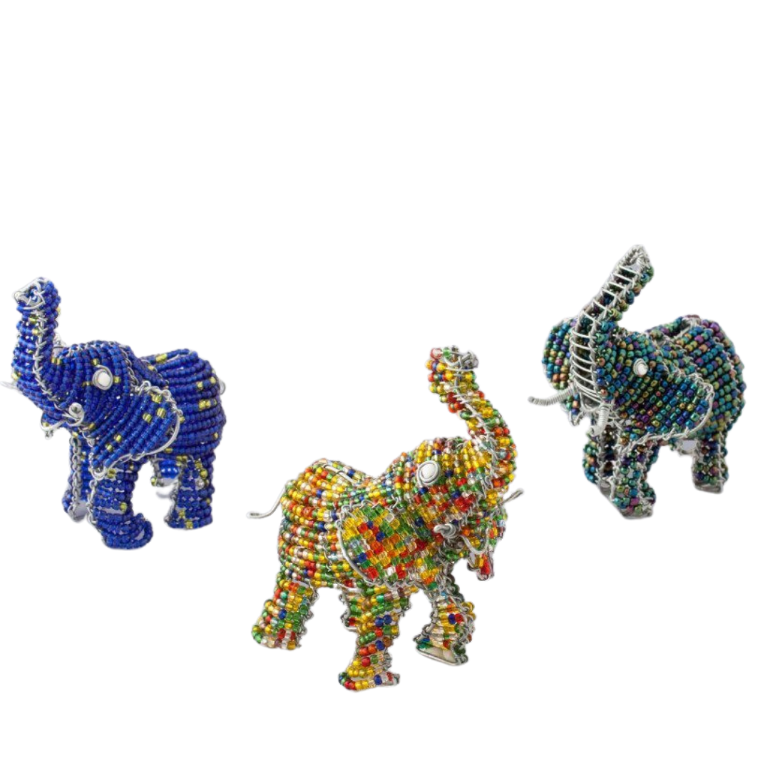 Hand made beaded African Elephants;  one in blue bleads, one in multicolor beads, and one in dark blue.  Trunks point up for Good Luck. Fair trade products.