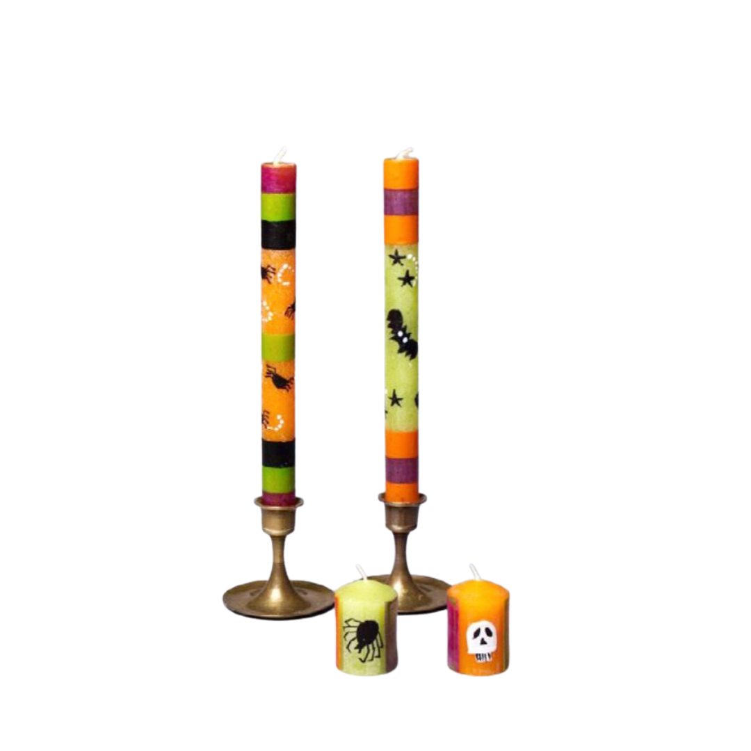 Halloween hand made & hand painted taper candle pair and votives. Tapers are displayed in gold taper holders.  Painted with fun Halloween designs.  Fair Trade home decor.