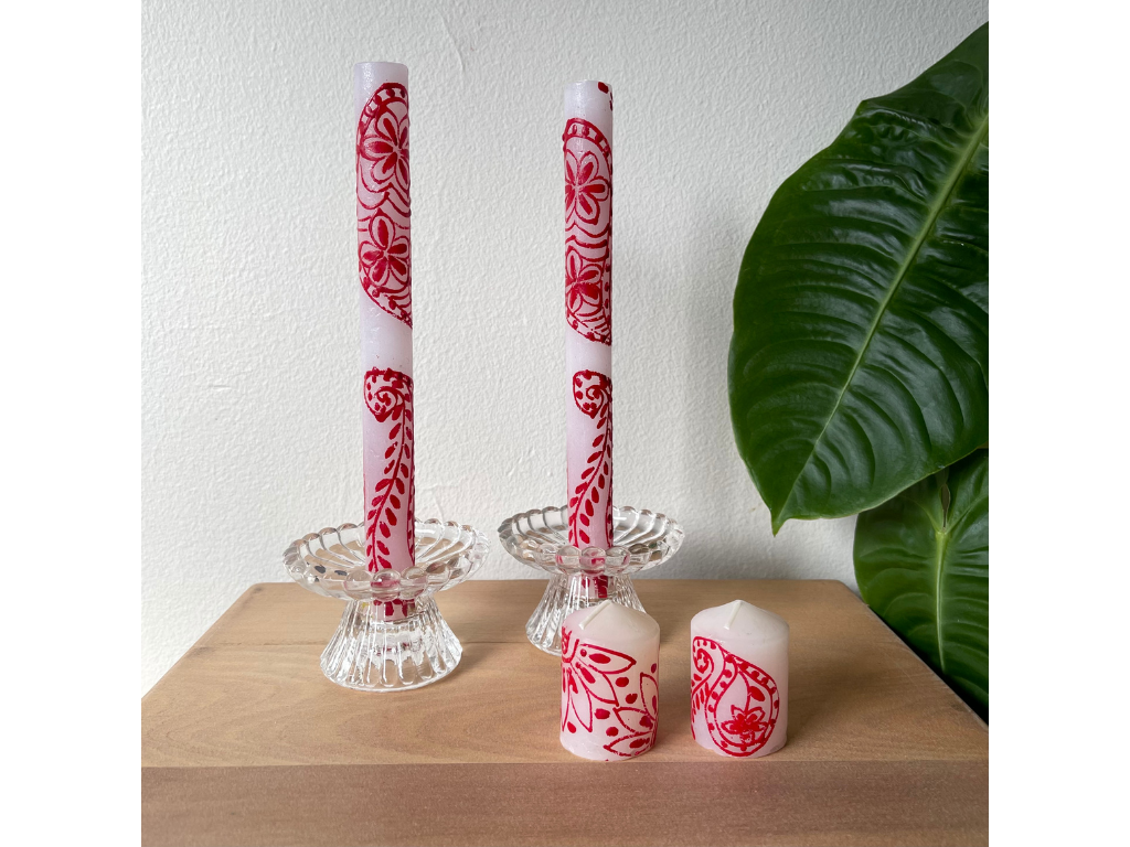 Henna Red on White taper candle pair in glass taper holders, with two Henna Red on White votive candles in front.  Red henna designs on white candles.  Hand made in South Africa. 