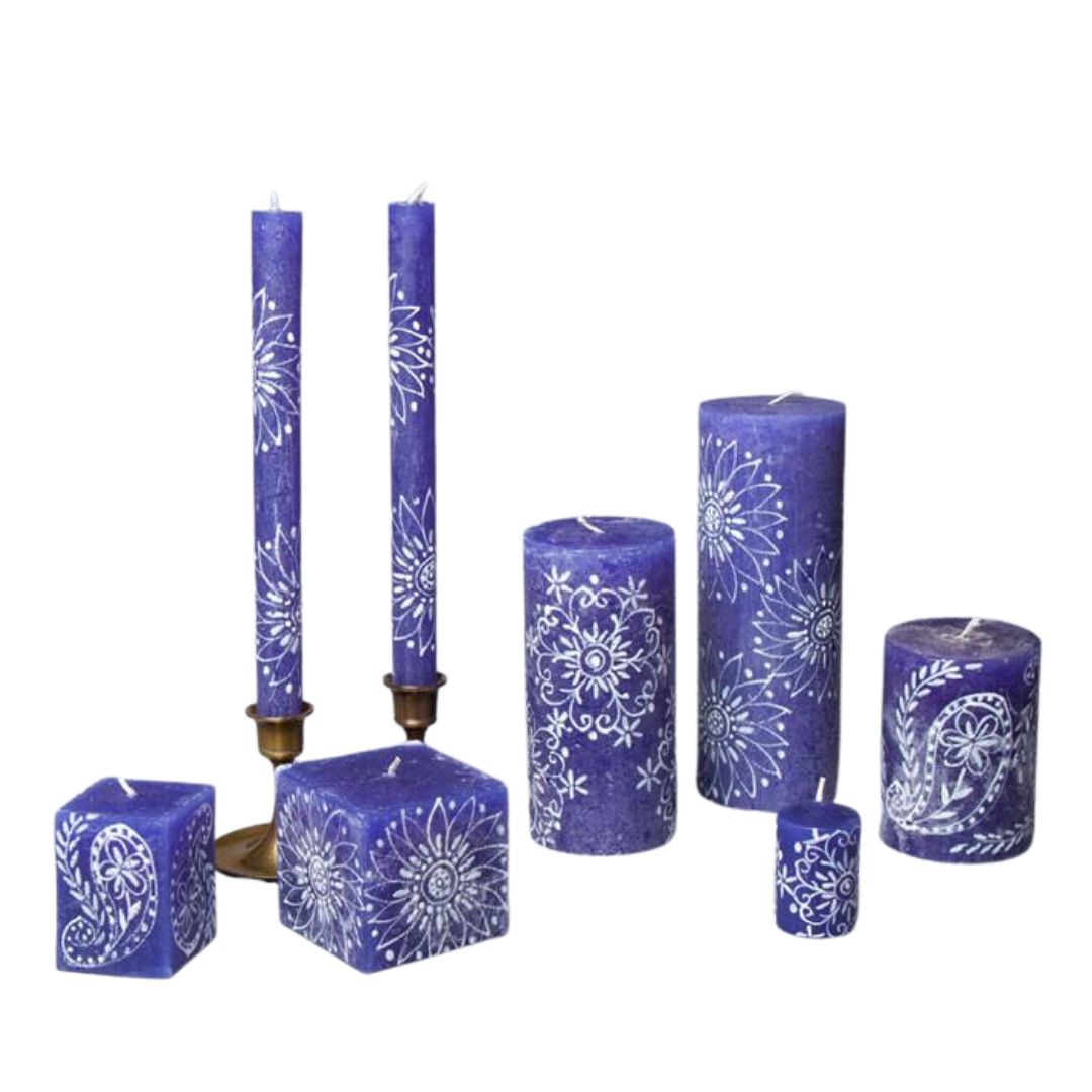 Henna White on Blue Hand made & Hand painted Candle Collection.  Cube candles, taper candles, pillar candles and votive candles.  All painted with white henna design on a frosted blue candle.  Fair Trade Home Decor.