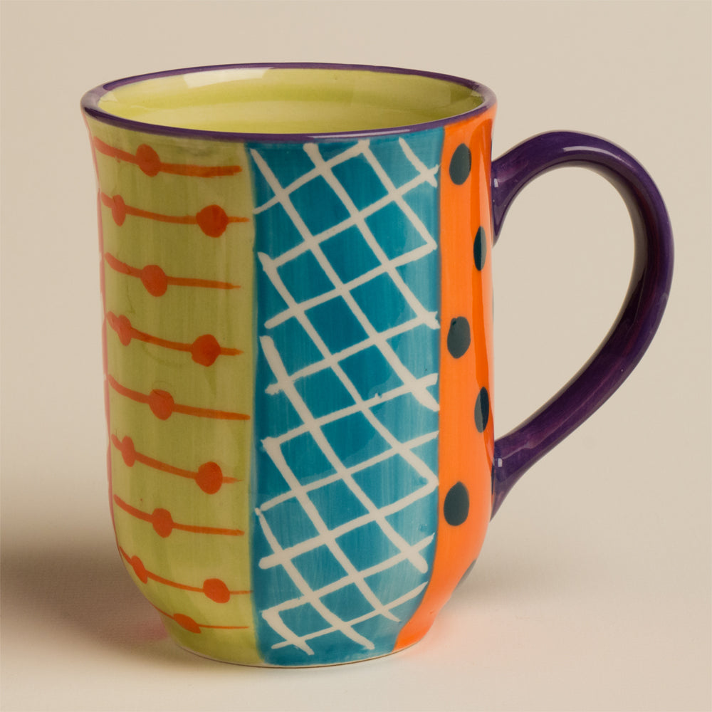 Carousel hand made and hand painted ceramic coffee mug. Hand painted in the colors of carousels; yellow, turquoise, orange, blue, & purple!