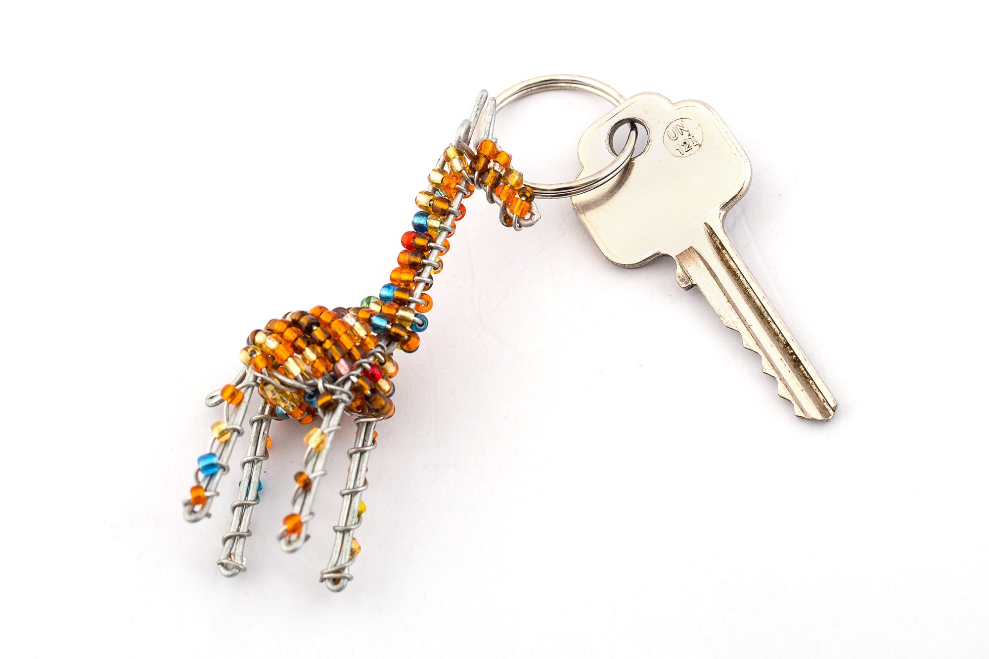 Beaded giraffe key chain. Handmade in golden beads with flicks of blue. 