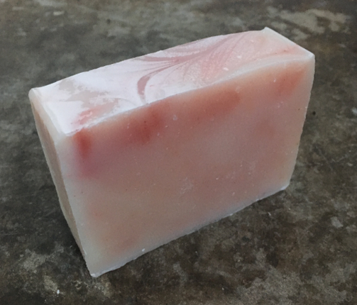 The Candy Maker soap bar that is yellowish in color and has the scent of peppermint