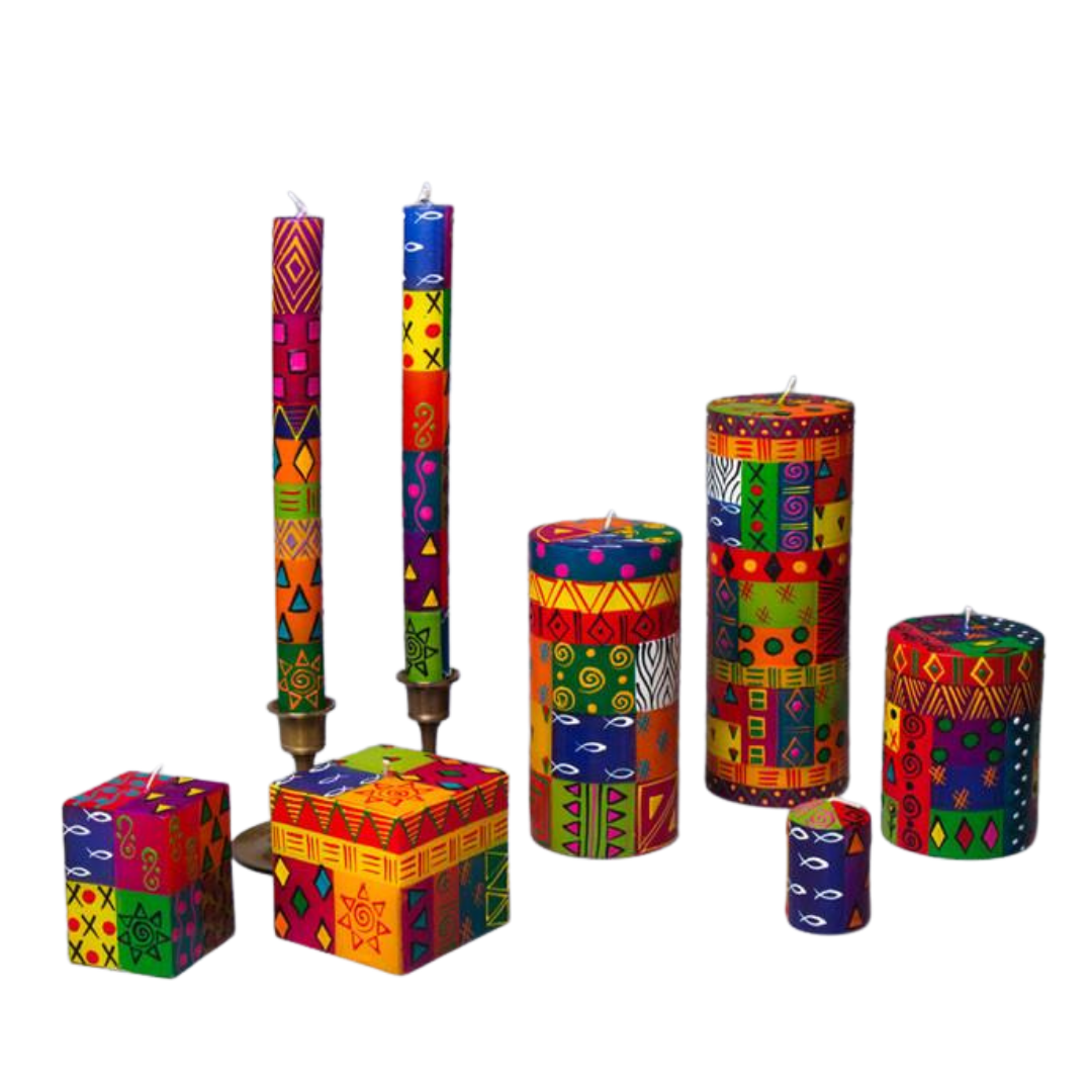 Multicolor Ethnic hand made & hand painted candle collection. Cube candles, taper candles, pillar candles and votive candles, all painted in bright colorful African Ethnic designs with yellow, red, green, blue, orange, and pink!