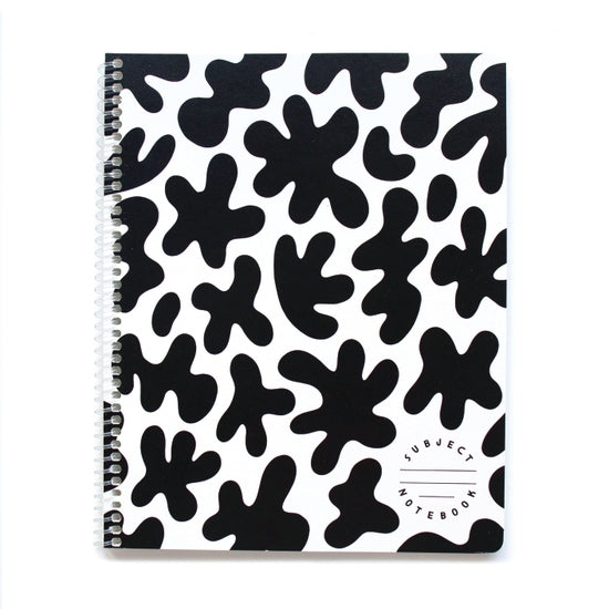 8" x 10" notebook with white background and fun black 'splashes". Recycled paper. 