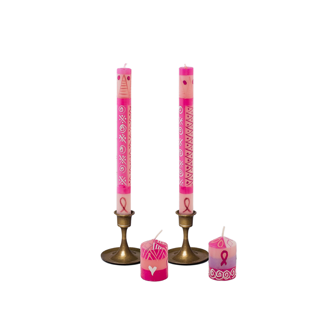 Pink on Pink taper candle pair in gold taper candle holders.  Dark pink & white design painted on light pink background.  Two votive Pink on Pink candles in the foreground.