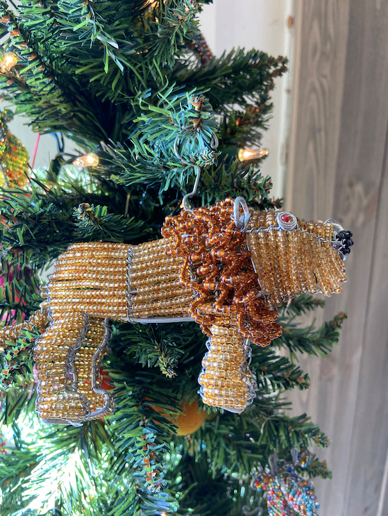 The hand made beaded animals are fun to use a tree ornaments!  Here is a lion. Fair trade products.