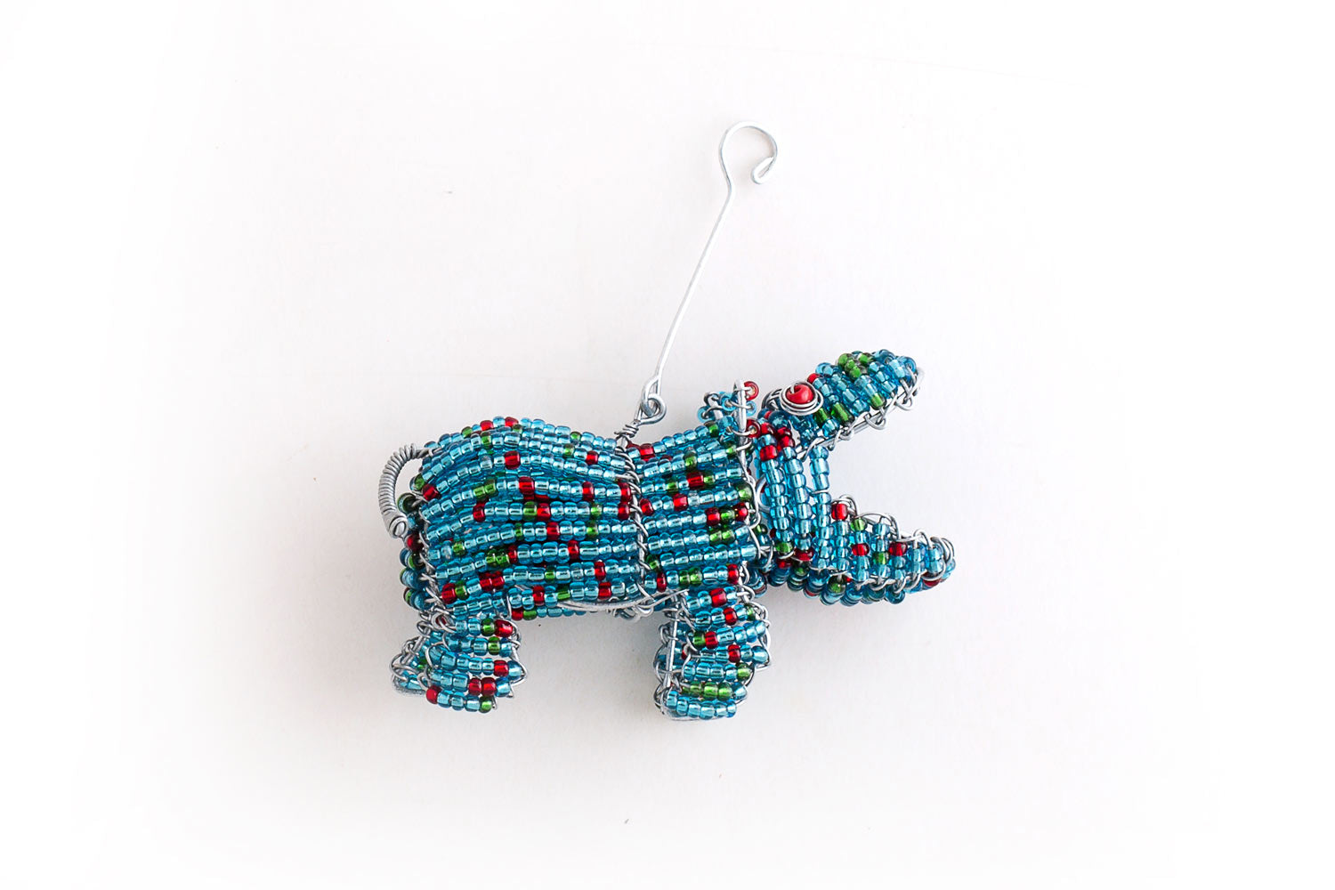 Christmas blue hand made beaded hippo for your tree. Comes with a hanger in a gift pack of three with an elephant and giraffe.
