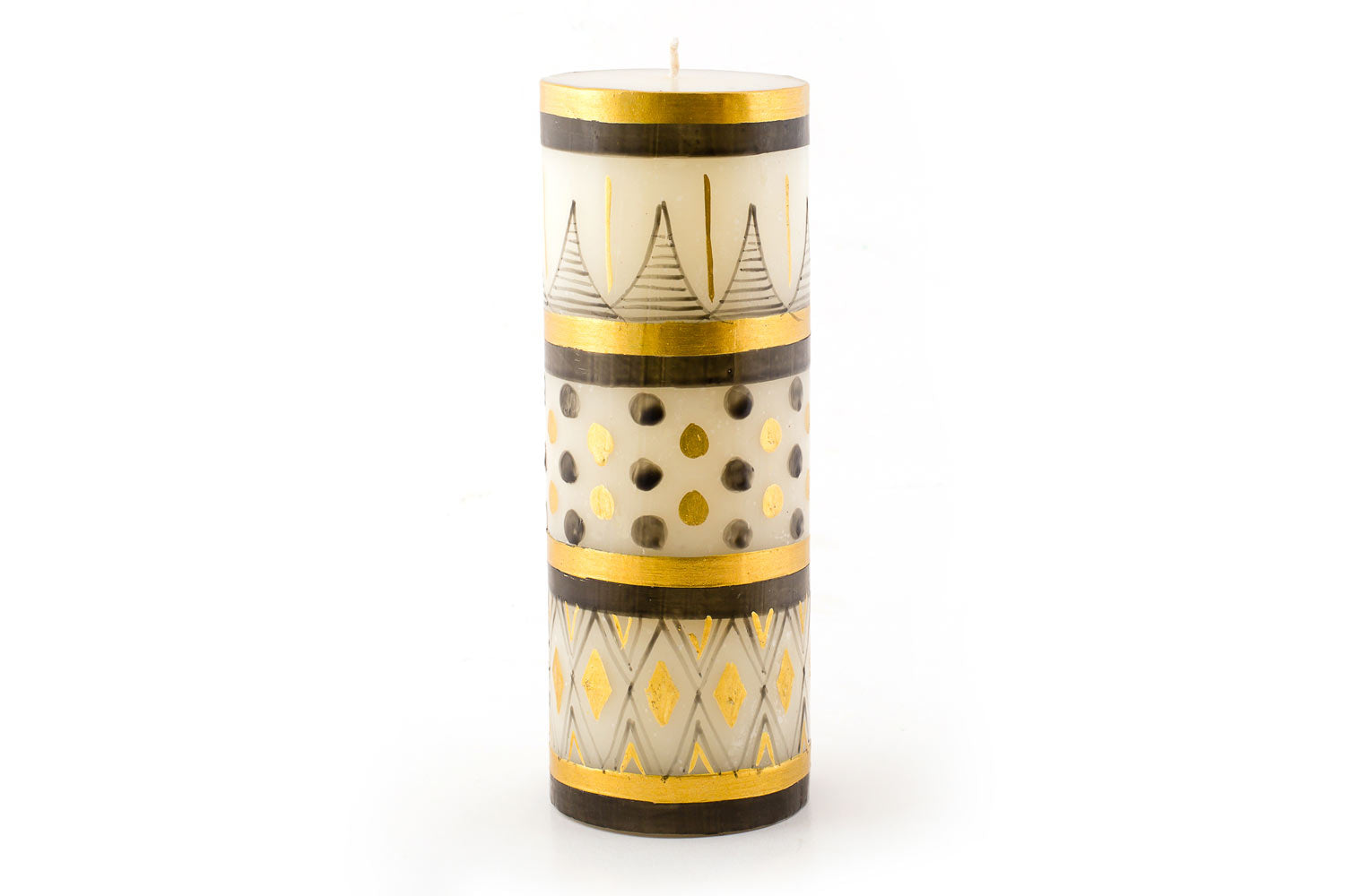Celebration design 3" x 8" pillar candle. White background with grey/black and gold hand painting of dots, geometric and stripe designs. Fair Trade.