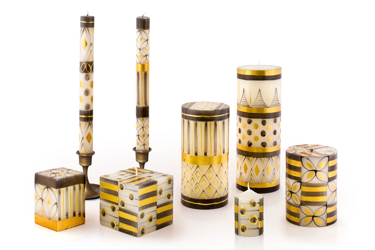 Celebration Handpainted Candle Collection. White background with gold and dark grey designs. Wonderfully festive, and perfect for any celebration!