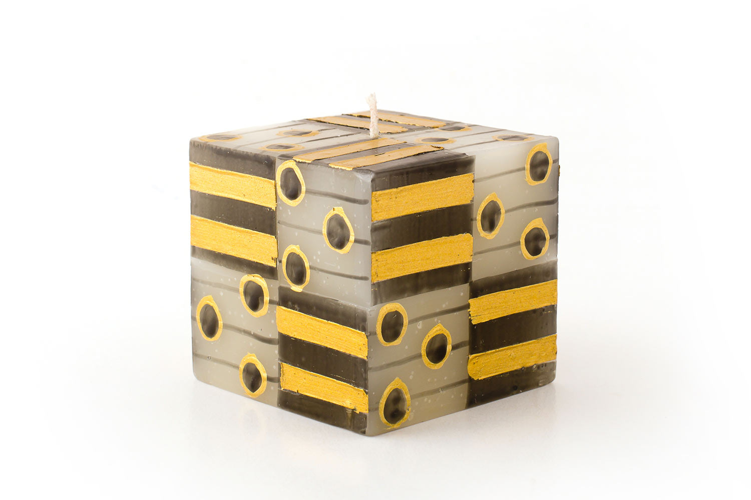 Celebration 3"x3"x3" cube candle.  Hand painted on white candle, gold & grey/black stripes & dots. Fair Trade.